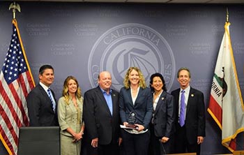 Ashley Chelonis Named 2017 California Community Colleges Classified Employee of the Year photo of Ashley Chelonis at award ceremony