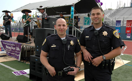Photo of two officers at campus event