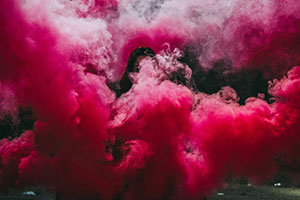 OC Live - Creating Social Change Through Reality Improv photo of Pink Smoke