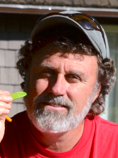Steve on the organic Farm in BC Canada with a Seet Pea