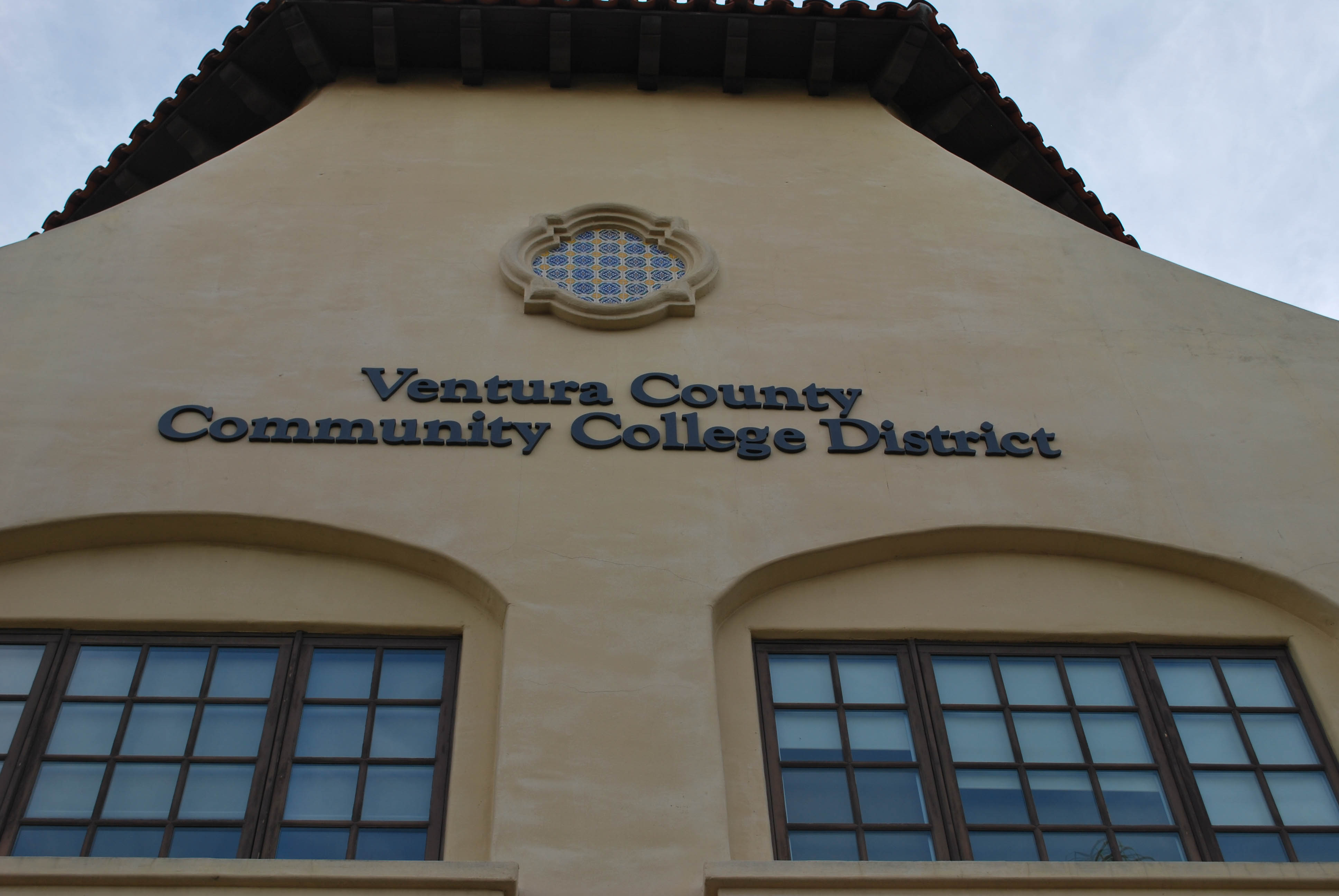 Side of DAC building with windows and sign "Ventura County Community College District"