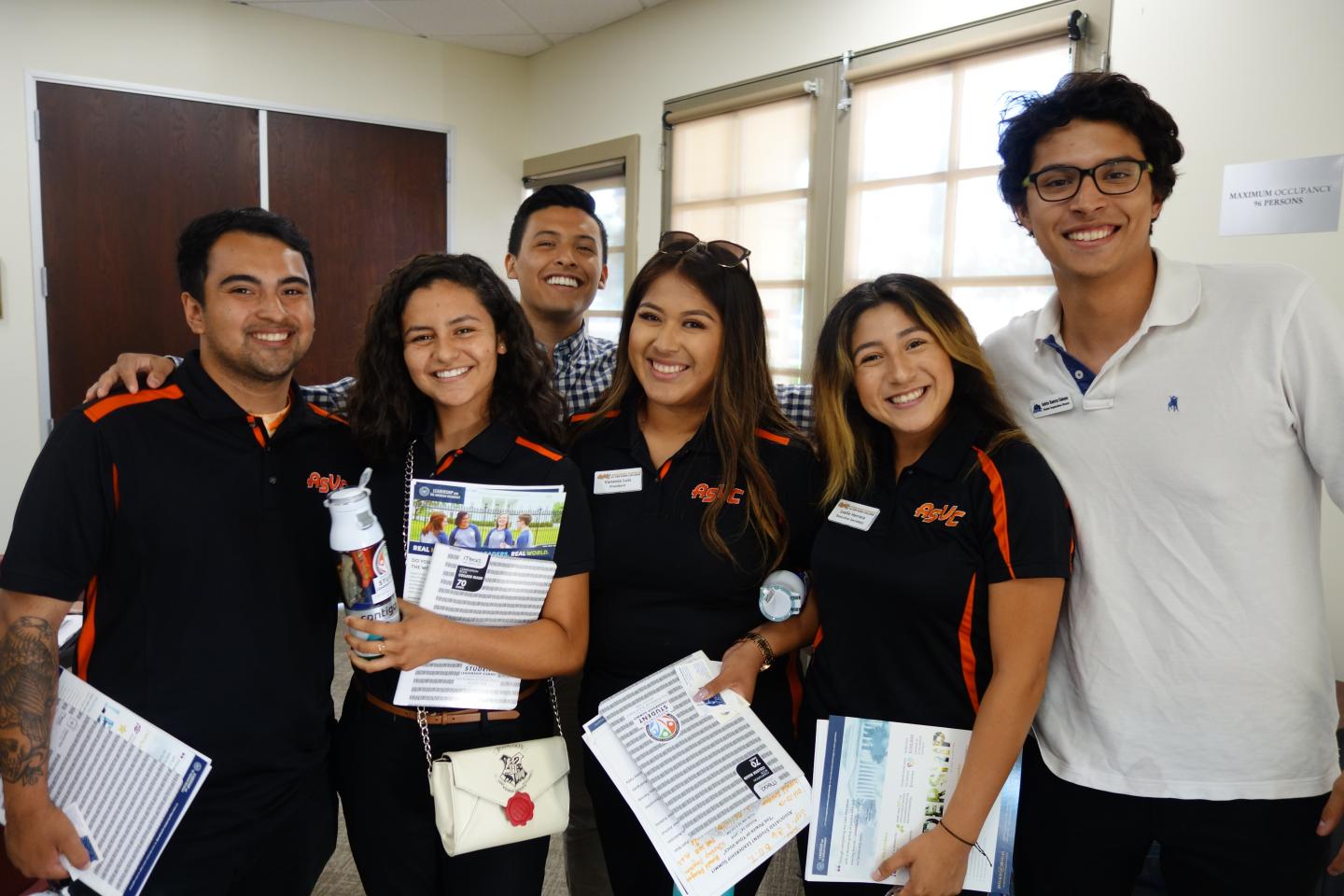 Vanessa Luis (center) with her fellow ASVC members 