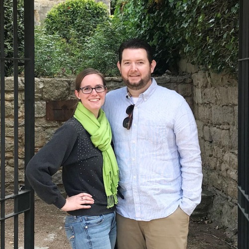 Dan Casey, man with short dark brown hair with a trimmed beard, with his wife, Victoria, a woman with light brown hair pulled back into a ponytail and wearing glasses