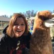 Picture of Lori Wolf and a stuffed llama
