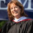 Professor Brown in academic robe at Moorpark's graduation celebration