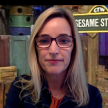 Cindy Sheaks with Sesame Street Set in Background