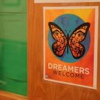 Sign on a door with a butterfly and the text &quot;Dreamers 