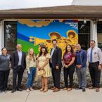 Oxnard College leaders and artists standing in front of new 