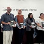 Photo of Chancellor MacLennan, Board Chair Perez, and Classified Employee of the Year Honorees holding plaques: Brian Dederian, Kristen Robinson, Erika Hurtado, and Fidelia Flores