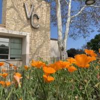 Outside the Ventura College Admin building, overlooking california poppies.
