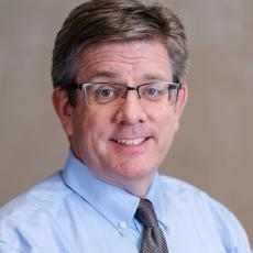 Matthew Moore wears a styling tie in a slightly work formal apparel