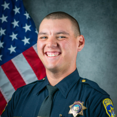 Official department photo of Officer Dylan Valdez in his Class A uniform.