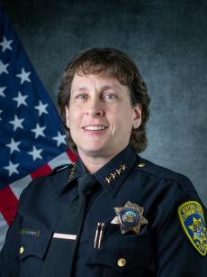 Headshot portrait of VCCCD Chief of Police Kelli Florman in police uniform