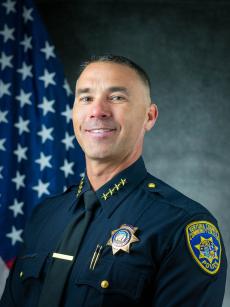 Official department photo of Interim Chief Michael Pallotto in his Class A uniform.