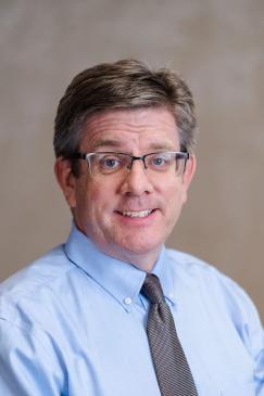 Matthew Moore wears a styling tie in a slightly work formal apparel