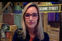 Cindy Sheaks with Sesame Street Set in Background