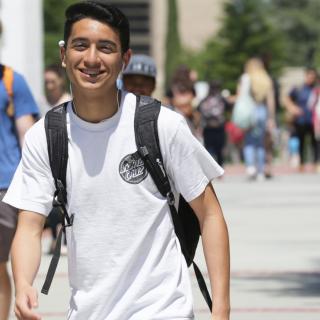 student with backpack