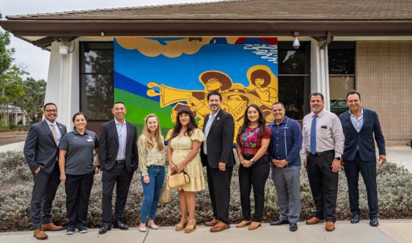 Oxnard College leaders and artists standing in front of new 