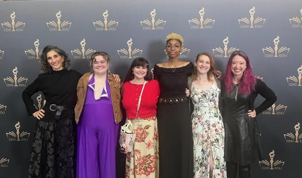 Professor Risdana standing proudly with Theatre Arts student