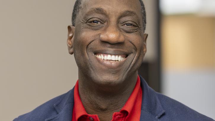 President Sokenu smiling