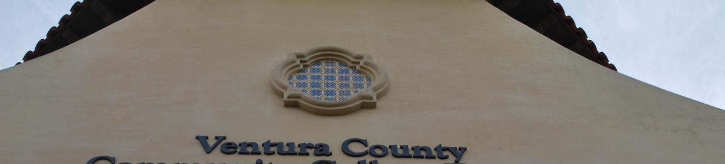 Side of DAC building with windows and sign "Ventura County Community College District"