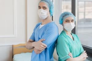 Nurses wearing scrubs and masks Nurses wearing scrubs and masks