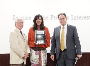 Classified Employee of the Year Deb Brackley with Board Chair Bernardo Perez and Chancellor Rick McLennan