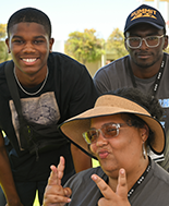 Two Students with a MC Employee at the MC Welcome Event